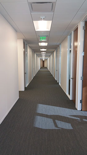 Illuminated hallway at Superior Energy Consolidated.